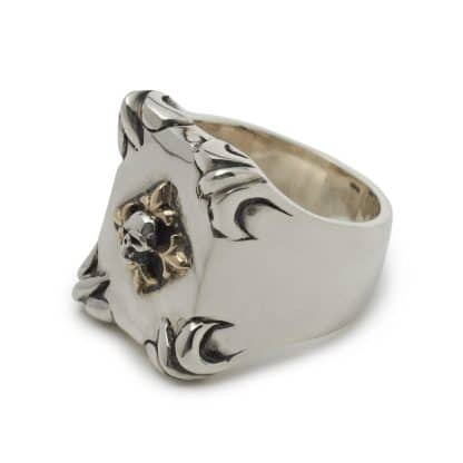 shield-with-skull-and-gold-fleur-de-lis-ring-angled-scaled-1.jpg