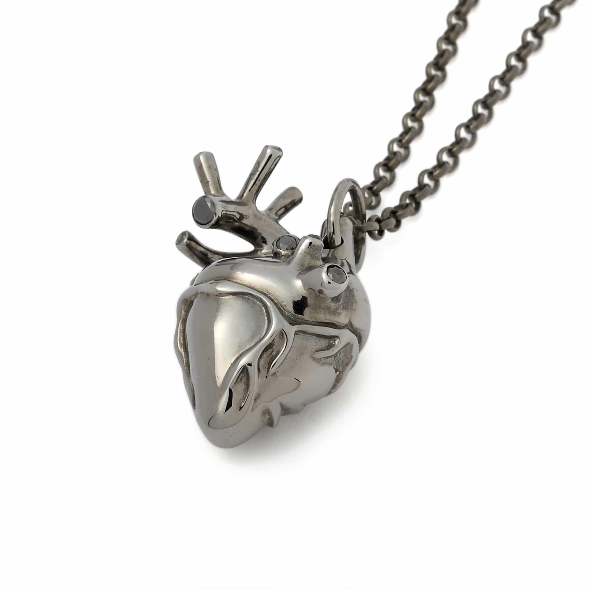 strangefruit-rhodium-plated-anatomical-heart-diamonds-front-1.jpg