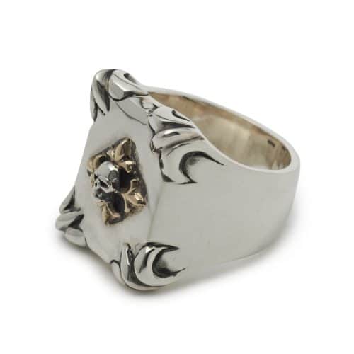 shield-with-skull-and-gold-fleur-de-lis-ring-angled